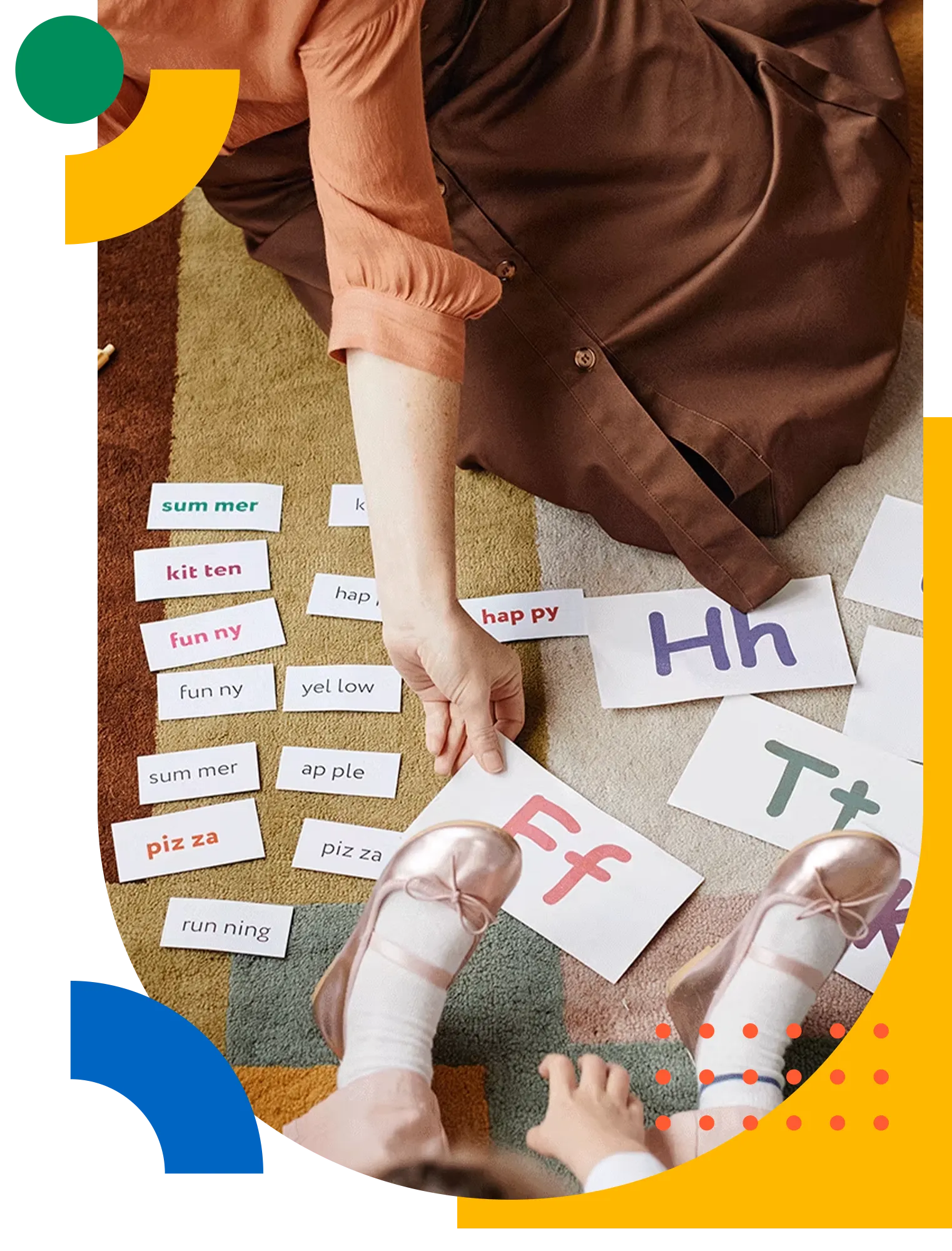 A child arranging phonics flashcards on the floor during a lesson